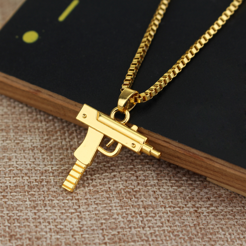 Trendy Uzi Gun Shaped Pendant  - Street Fashion Baggy recensie en prijs